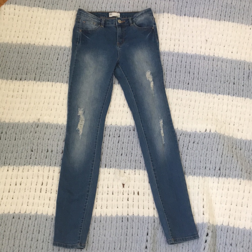 Medium Wash Lightly Distressed Skinny Jean
